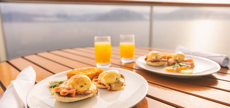Cruise ship vacation food breakfast on suite balcony table.