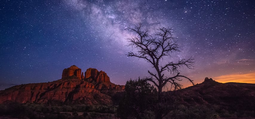 A beautiful shot of the Cathedral Rock under the stars, Milky Way on the night starry sky