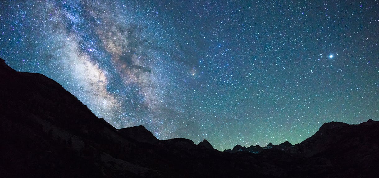 Milky Way rising over mountain silhouettes at Yosemite