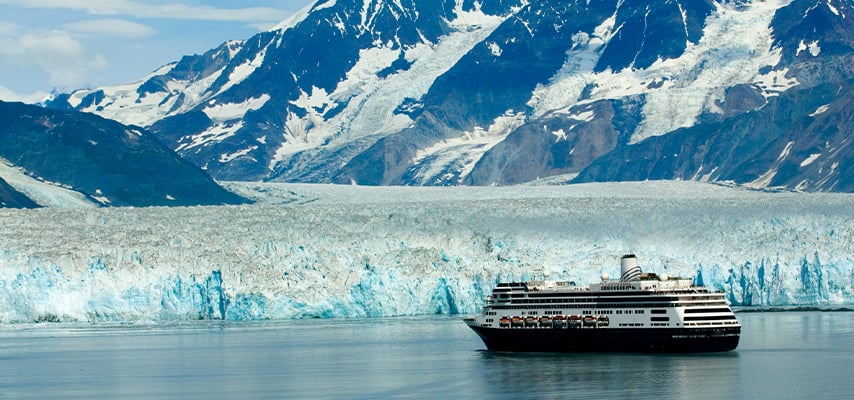 Alaska cruise shiip boat near glacier ice and mountain in pacific ocean