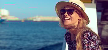 Happy woman on cruise ship
