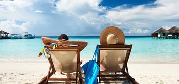Couple on the beach at a tropical resort