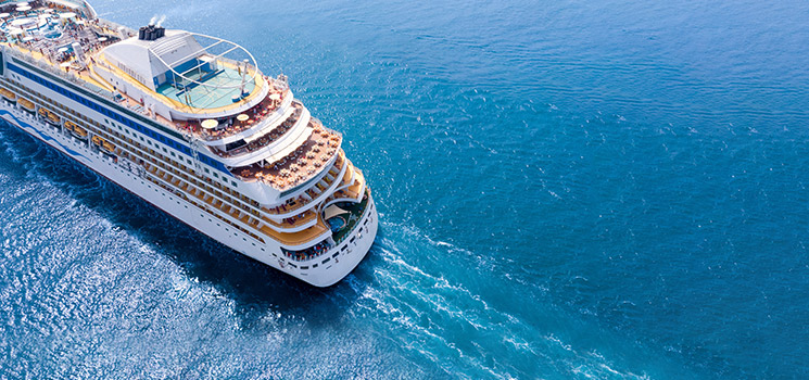 cruise ship sailing through ocean
