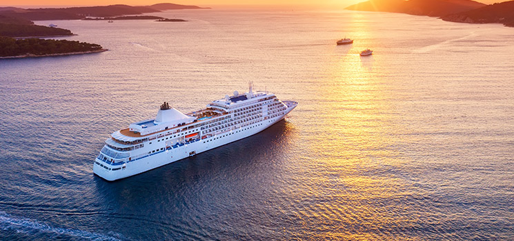 Aerial view at a cruise ship during sunset